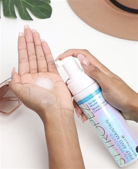 how to remove self tanner from hands.